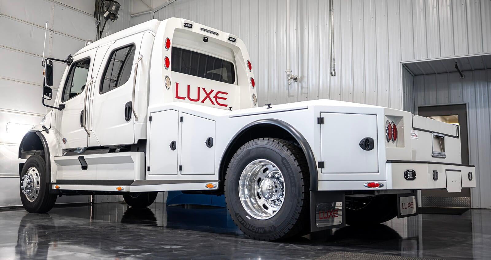 Freightliner M2 106 RV Hauler Luxe Trucks White